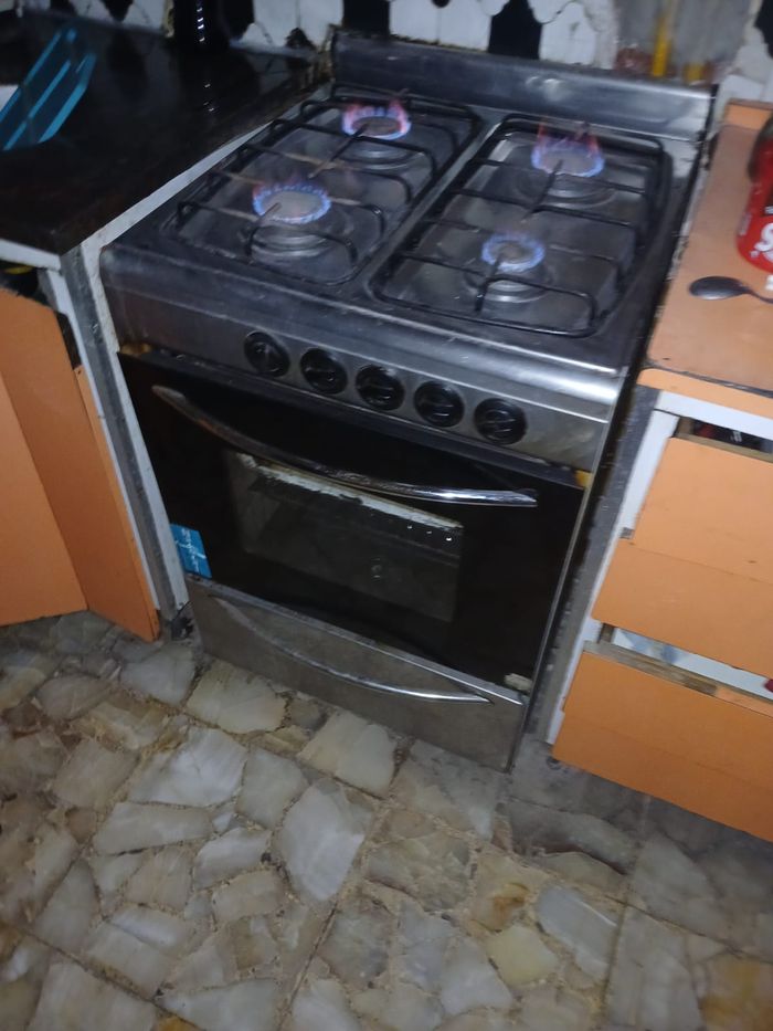 Después – Cocina reparada con llamas azules perfectas